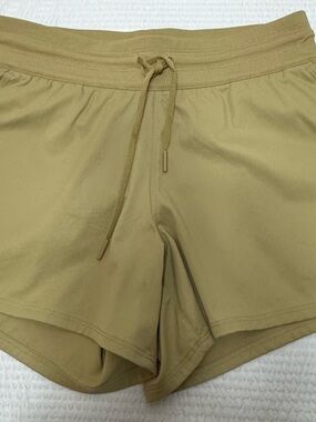 The  north  face Women’s Athletic Drawstring Shorts in Khaki invisible pocket